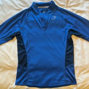 Gymshark 1/4 zip blue long sleeve shirt. Size medium.